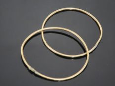 Two 10ct Gold Bangles which have a combined weight of approx 8.3g (est £90-£120)
