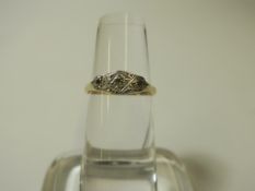 A 9ct Gold three stone Diamond Engagement Ring (size N) (est £30-£60)