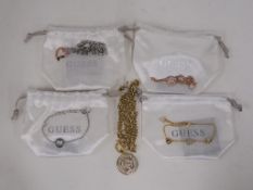 * Five items of new 'Guess' jewellery to include Pendant and Bracelets (includes four drawstring