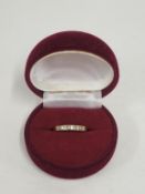 An 18ct Gold Ring with 10 Diamonds (Total 0.1ct) Total Wt 2.9g (Size M½) (est £120-£180)