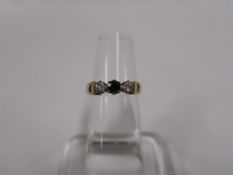 A 9ct Gold, Diamond and Topaz? Ring Size N (est £50-£80)