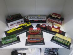 A Shelf comprising of three Model Lorries- Eddie Stobart Fridge Trailer and a Flatbed, Carters Steam
