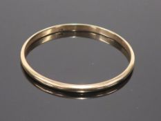 A 14ct gold Bangle Approx. 8.9g (est £140-£180)
