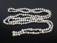 A String of Freshwater Pearls weighing approx. 46g and 110cm long (est £100-£150)