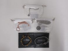 * Five items of new 'Guess' jewellery to include Pendants and Bracelets (each with either a