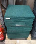 62 X Green Carpet Tiles. Please note there is a £5 Plus VAT Lift Out Fee on this lot.