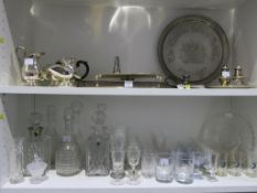 Two shelves to include Mixed Glassware and Silver Plated Items to also feature Solid Silver Sugar