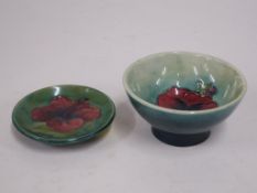 A Moorcroft Pin Dish with Hibiscus Pattern together with a Moorcroft Pansy Dish (diam 8cm, H 1.