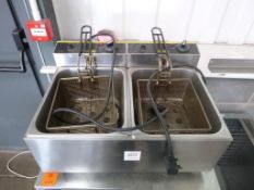 A Buffalo Twin Stainless Steel Fryer together with a Parry Stainless Steel Cupboard