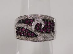 Diamonds and Rubies set White Metal Ring (size O) (est £50-£100)