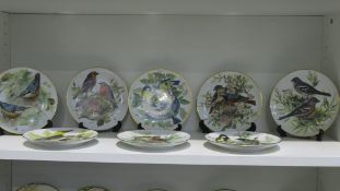Two series of Limited Edition plates: one depicting Songbirds of Europe issued by the house of