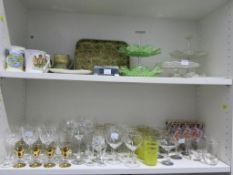 Two shelves to include a selection of Glassware, Cakestands, Mugs etc (est £20-£40)