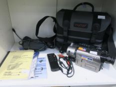 A Shelf containing a Sony HI8, 72X Digital Zoom Video Camera Recorder complete with AC Power