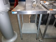 * A small F.E.D Preparation Table with Under Tier and Splash Back
