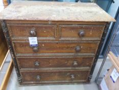 A well worn Pine Chest of two over three drawers (H96cm, W103cm, D52cm) (est £20-£40)