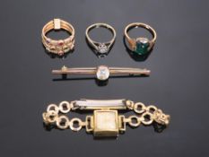 A selection of jewellery to include Gold coloured Tie Pin, a Triple Ring (size M) with Multicoloured