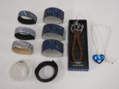 Nine Diamonte covered Bracelets in various colours and styles, one Blue Heat Shaped Pendant Necklace