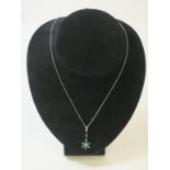 This is a Timed Online Auction on Bidspotter.co.uk, Click here to bid. A Silver, Emerald and Diamond