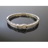 This is a Timed Online Auction on Bidspotter.co.uk, Click here to bid. A White Metal Buckle Bracelet