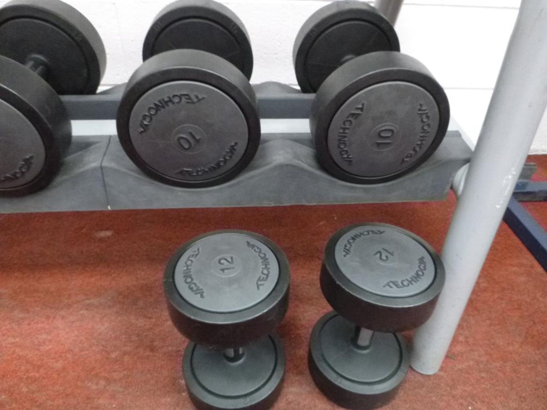 * A TechnoGym Weight Stand complete with Dumbbells, 2 X 20Kg, 2 X 18Kg, 2 X 16Kg, 2 X 14Kg, 4 X - Image 2 of 7