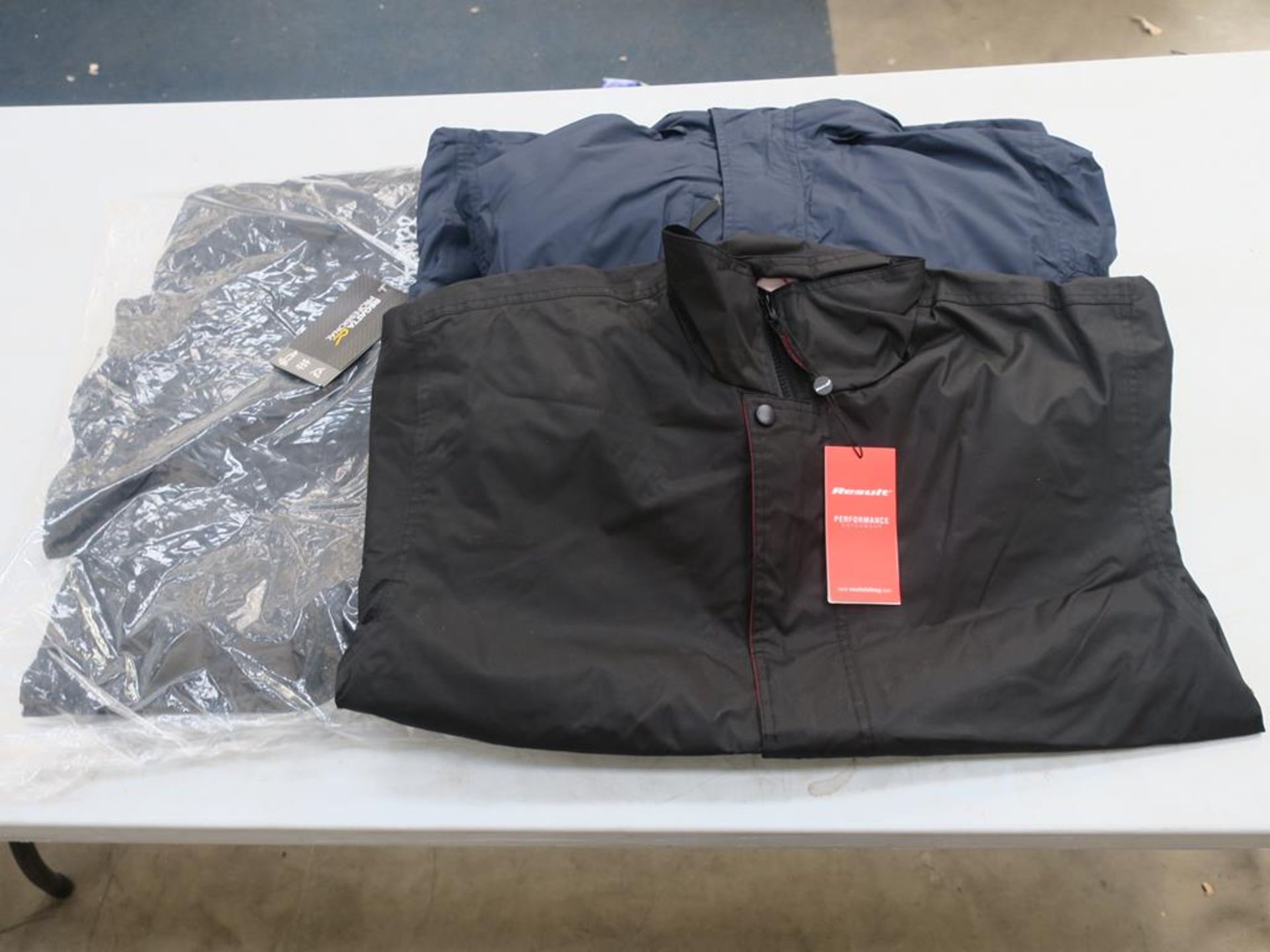 * A box of Waterproof Jackets in Navy and Black (sizes include S,M,and L (5)