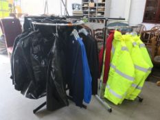 * A selection of Clothing Racks (some on wheels) and contents, including Black PVC Coats (size