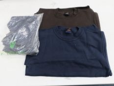 * A box containing a selection of tops including Black short sleeve Polo Shirts, Black Jumpers, Navy