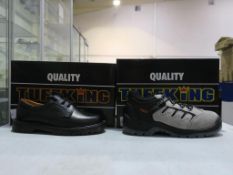 * Two pairs of new/boxed Tuffking Footwear: a pair of Black Deep Cleat Air Cushion Soled Non