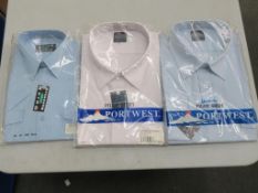 * A box of Blue and White Pilot Shirts in various sizes