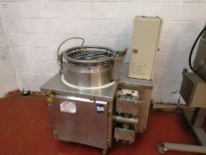 Chocolate mixer with Helical take off and vertical mixing paddles