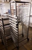 Two Mobile stainless steel tray racks (one rack has been cut down in height)