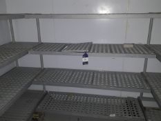 Shelving bays from walk-in freezer - 12 bays consist of removable plastic shelving and metal frame –