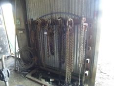 * Rack containing various chains, shackles, lifting blocks etc