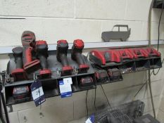 5 Milwaukee cordless tools with 4 chargers and 4 b