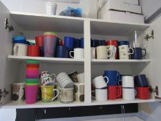 9 Enamel Mugs, 20 Ceramic Mugs, 2 Kettles and quantity plastic cups and mugs
