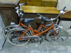 Two Peugeot Folding Bicycles each with Sturmey Archer gears and generator powered front and rear