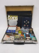 An Attache Case containing a quantity of Coins, Coin Monthly Magazines (1968/9) etc. To include a