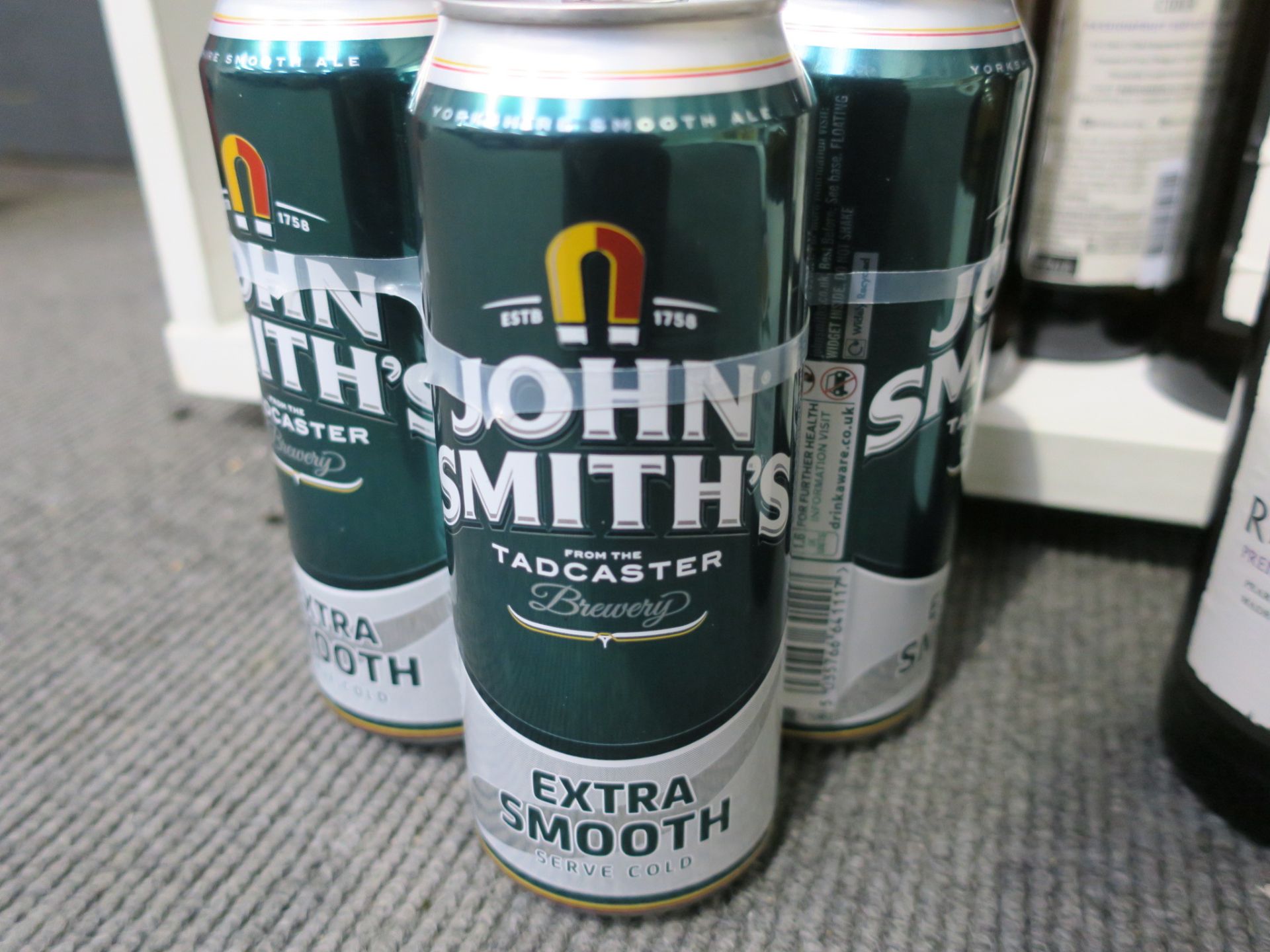 * Twelve cans of John Smith's Extra Smooth Yorkshire Ale 44cl 3.6% Vol, thirteen cans of Guinness - Image 4 of 7