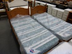 * A pair of 3 foot Single Beds with Pine Headboards and slatted framework (with Mattresses) (est £