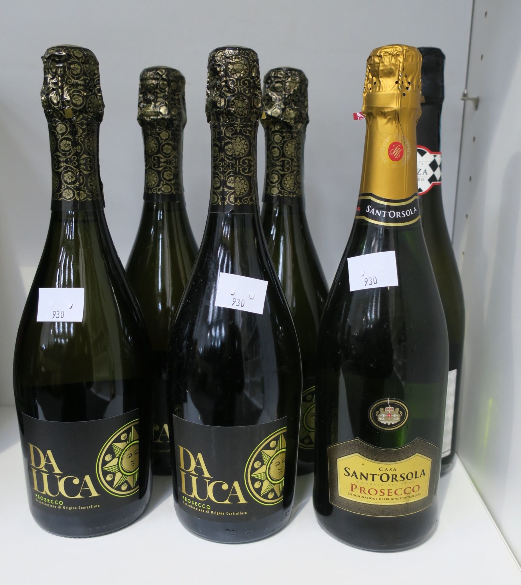 * Four bottles of Da Luca Prosecco 75cl 11% Vol, one bottle of Casa Sant' Orsola Prosecco 75cl 11%