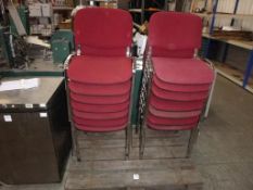 14 Red Stacking Chairs. Please note there is a £5 Plus VAT Lift Out Fee on this lot