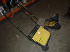 A Karcher KM550 Manual Brusher/Sweeper and Lawn Racker