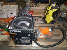 * A Titan TTB350VAC Vacuum and a Quest Vacuum