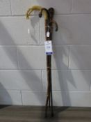 Four detailed assorted Walking Sticks: two with silver joints (est £15-£30)