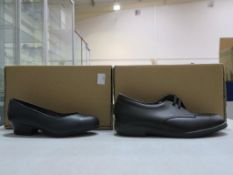 * Two pairs of New/Boxed Ladies Shoes. A pair of Black Antistatic Shoes size 8, and a pair of Navy