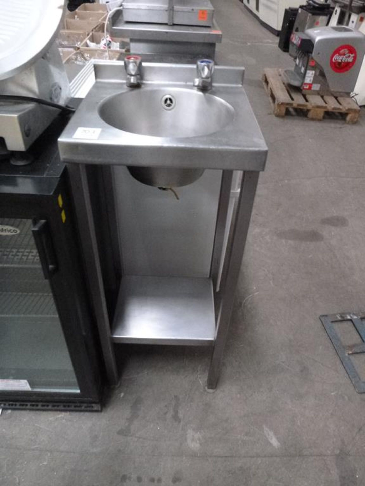 A Stainless Steel Single Sink Unit with Under-Tier