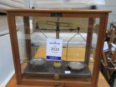 A Griffin & Tatlock set of brass Counter-Balance Scales in Display Case (est £40-£60)