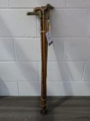 Four assorted Wooden Walking Sticks: two with brass tops (est £20-£30)