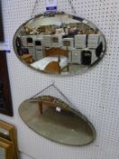 A collection of seven 'Art Deco' mirrors in various styles and sizes including an example with