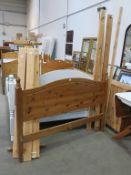 * A Pine Framed Bed (width of Headboard 145.5cm) with Slats and Central Support ( est £20-£40)